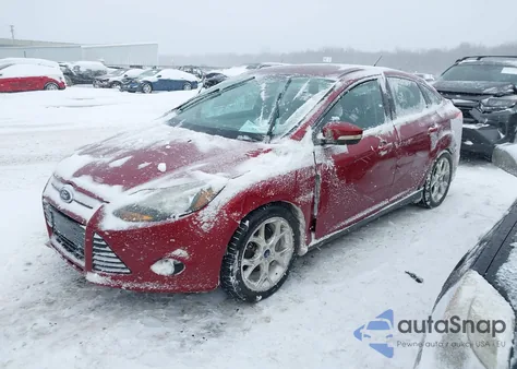 2014 Ford Focus Titanium z USA, uszkodzony, nr VIN 1FADP3J26EL193121